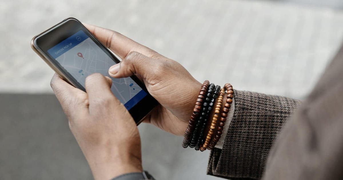 Traveler reviewing an AI-generated itinerary on a laptop