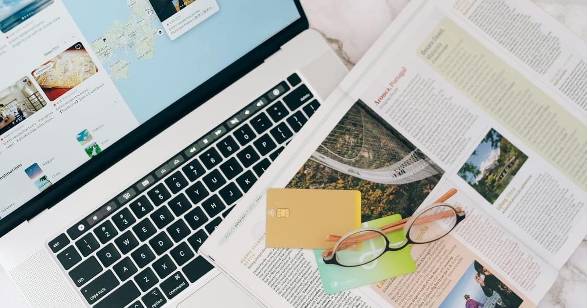 AI trip planning shown on a laptop and phone screen